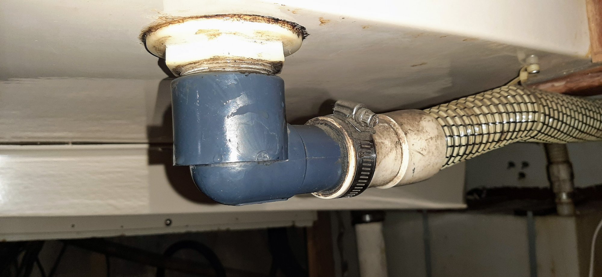 Repair and replacement of cockpit drains on a Hunter 34 Sailboat