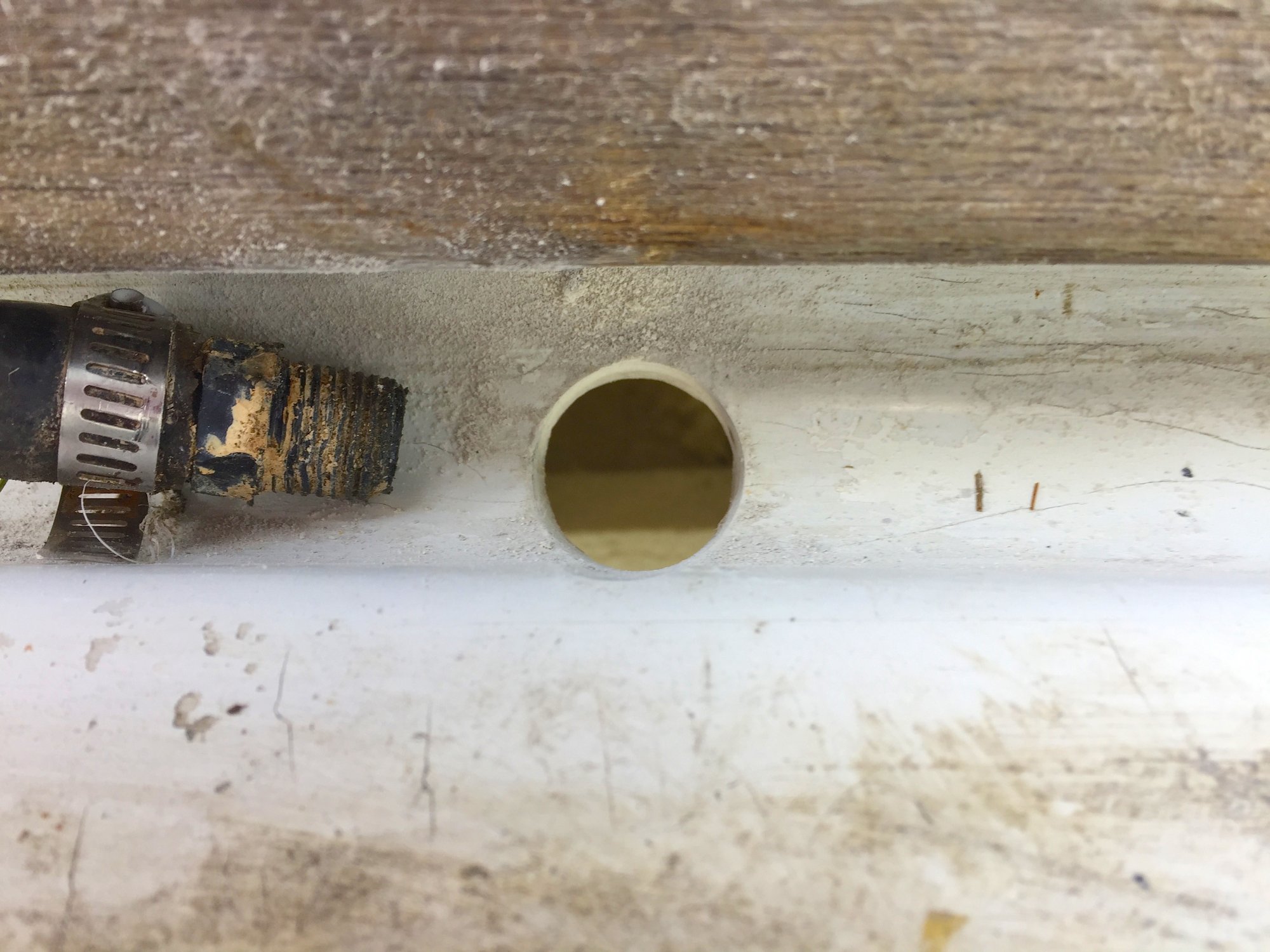 Drains new hole in gutter. .JPG