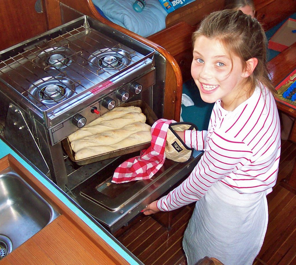 MJ pulls finished loaves.jpg