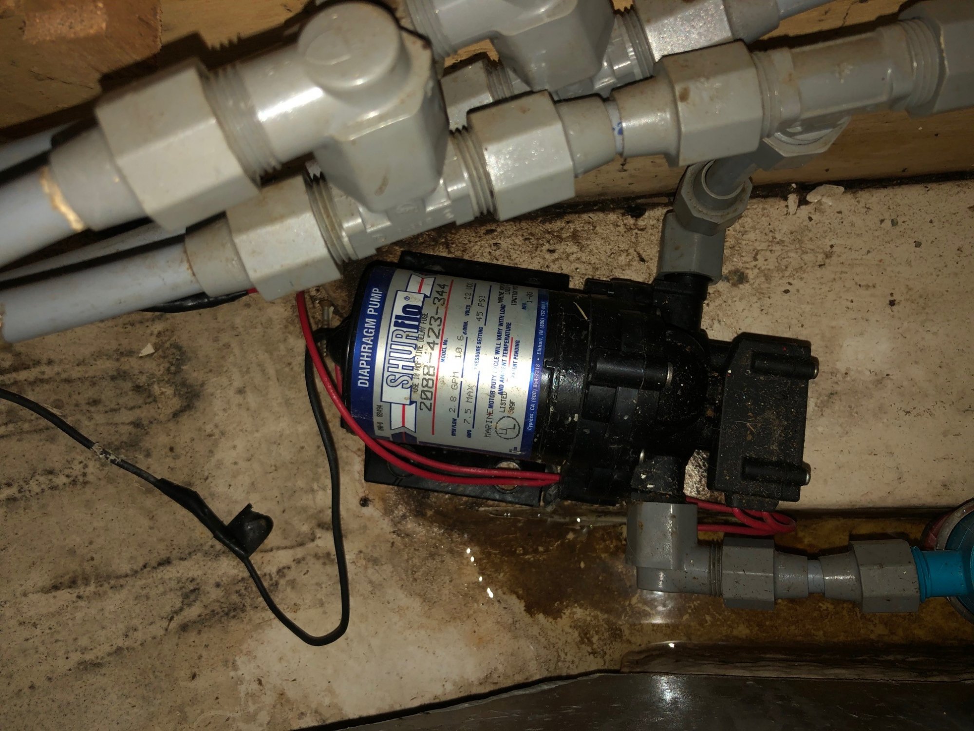 water tank discharge and pump close-up.jpg