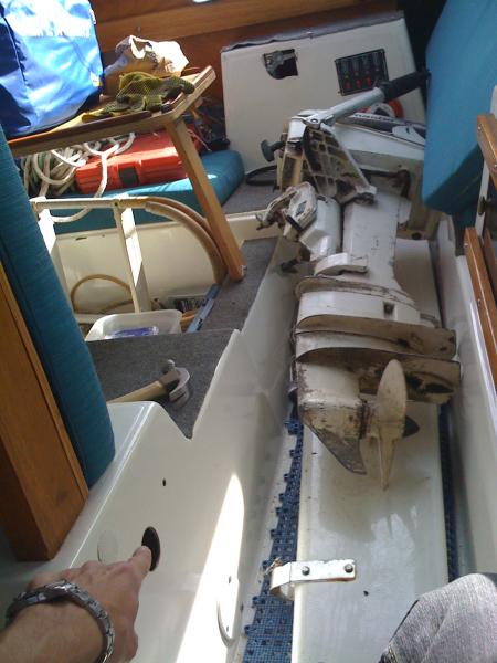 1. The keel lock bolt is located here (if you can find my hand within the mess). You have to remove a plastic plug.