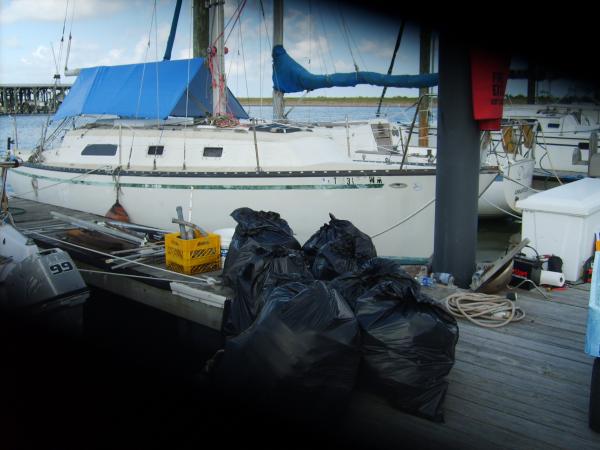 15 55 gallon contractor bags full of junk from inside