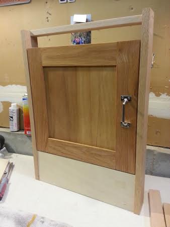 16&quot;x16&quot; cabinet door for some storage at the foot of our forward berth