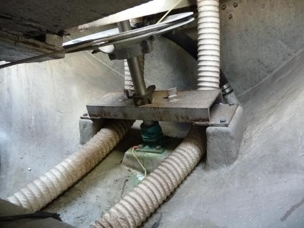 A view from inside the engine compartment after cleaning some galvanic rust off the rudders bolt plate.