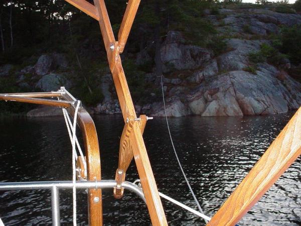 Anchor off the bow in 50 feet of water and stern tied to two trees. A line off each side of the stern. North Channel, Lake Huron