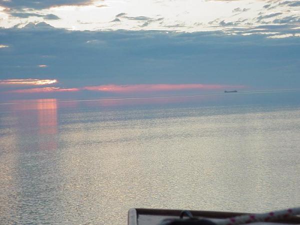 Anchored for the night about a mile west of Whitefish Point light house. A lakes freighter heading west on Lake Superor.