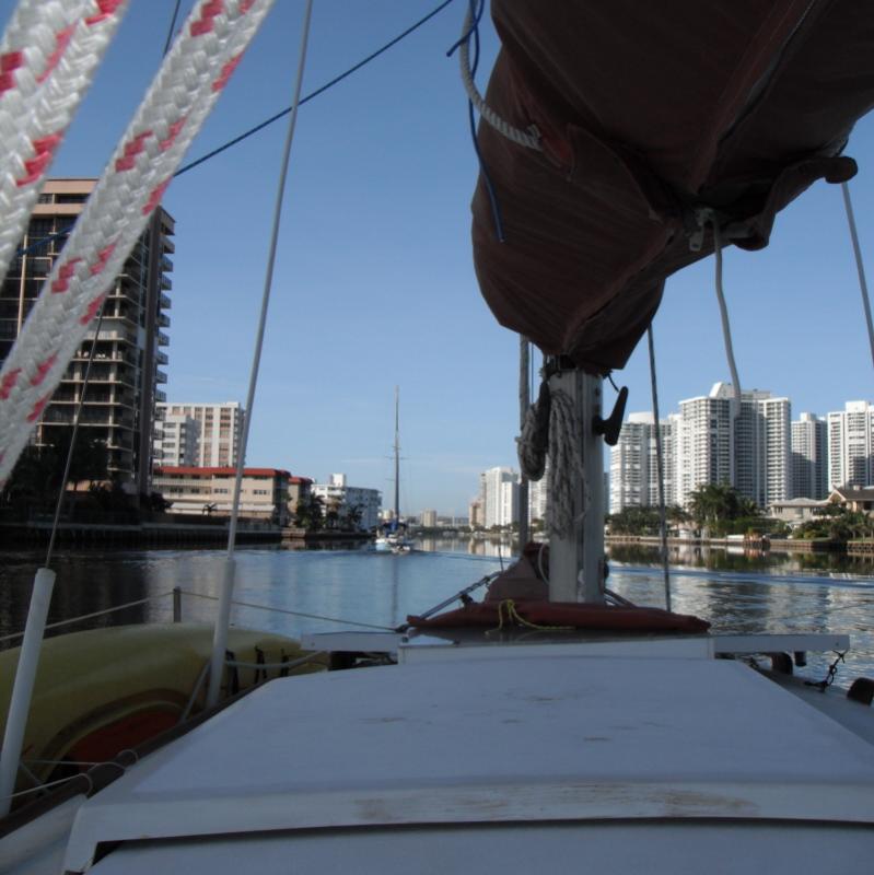 Angel (nervously) follows Defiant through southeast Florida's ICW. I was claustrophobic the whole time, and nervous going under all those opening bridges!