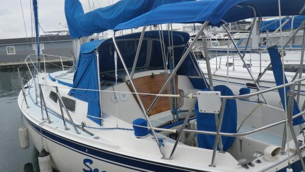 Another view of the bimini just installed.  A perfect combination of sun protection with some available between the dodger and the bimini.  All around the bridge deck mounted traveler.