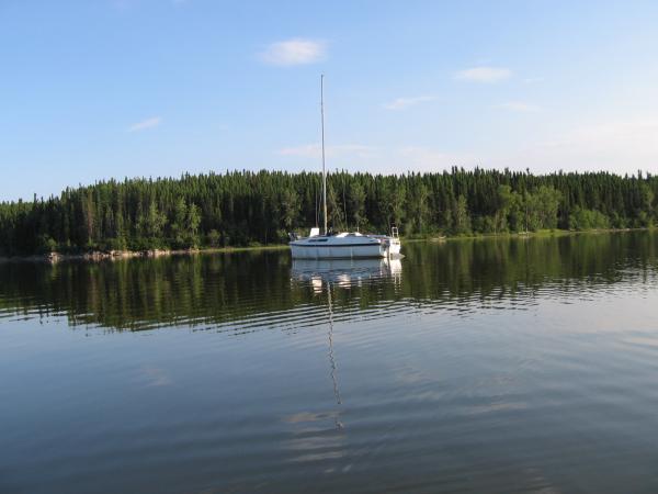 At anchor in a quiet bay.