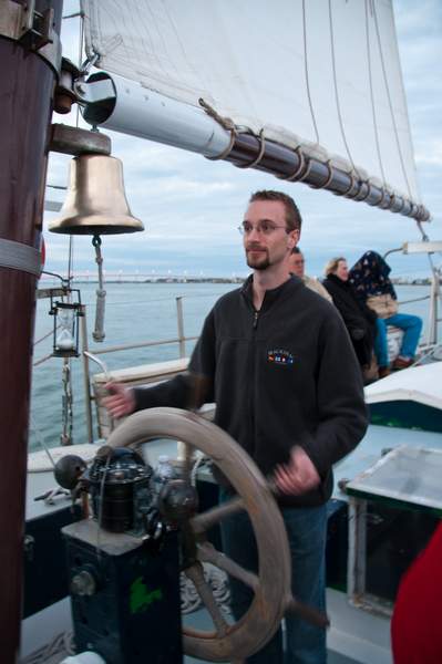 At the helm of the Schooner Freedom