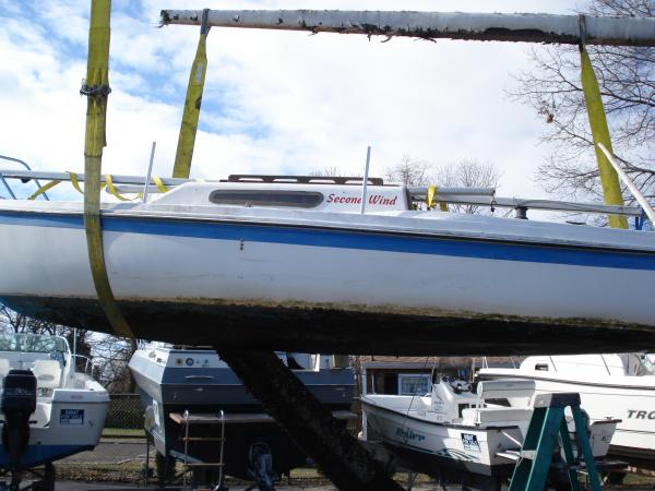 Boat at Northshore Yacht Sales. Getting lifted in the air for power washing, took 3hr of power washing and hand scraping to take all that crap off!!!!