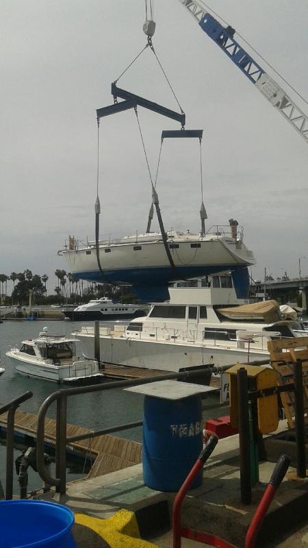 Boat sling going into water