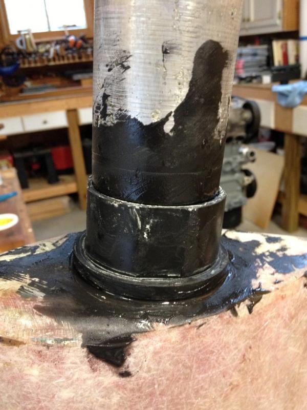 Bushing pressed down onto the epoxy/graphite mixture. Pictures are a little out of sequence.