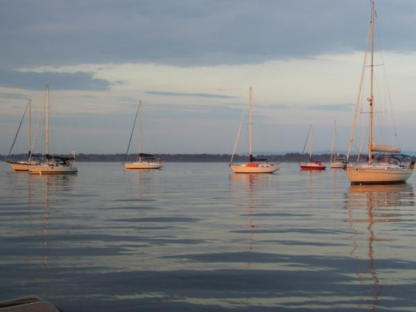 Carrie Bay, Lake Champlain (VT side).  Just after a storm, with setting sun. It really lit up the mooring field!