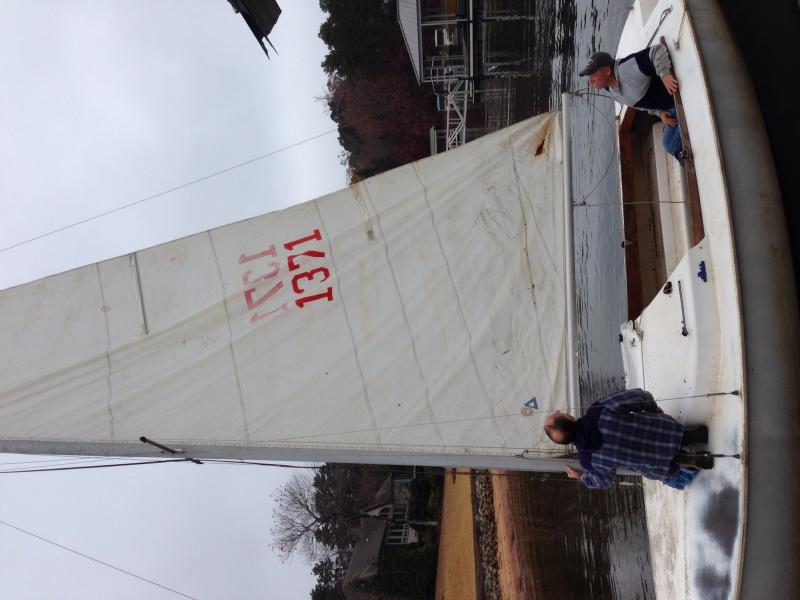 Cleaned up and checking the sail before taking out of the water some TLC!