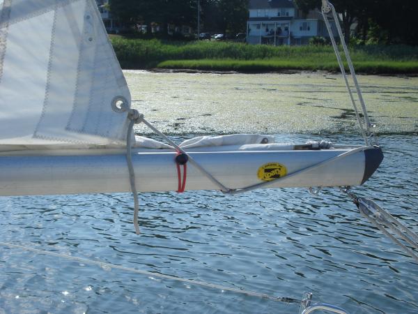 Clew side of the sail reefed on the Z-spars boom.