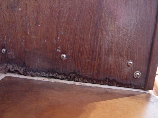 close up of starboard bulkhead rot along the bottom