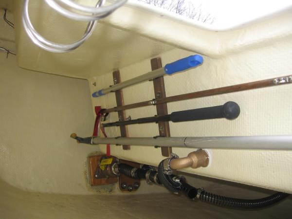 cockpit drain plumbing and &quot;pole&quot; storage area