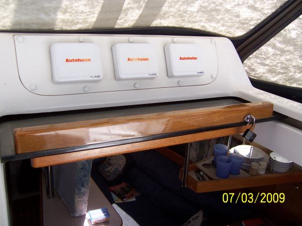Companionway hatch showing handle with five coats of System Three epoxy.
