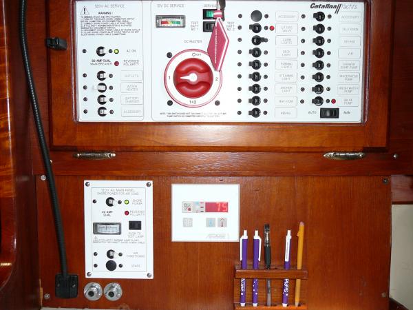 Complete redo of electrical including electrical panel from Seaward, fuse panel for HVAC,  thermostat, and future Windlass fuse.  All new wiring 90% of boat.