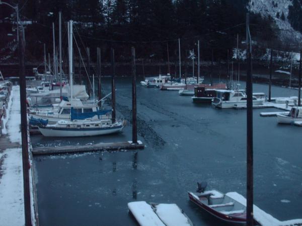 douglas harbor with a trail left from the harbormasters skiff