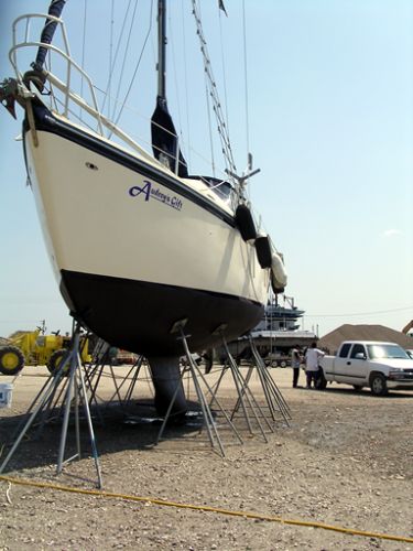 Dry dock and cleaning the bottom. Actually not bad.... Cast Iron Keel