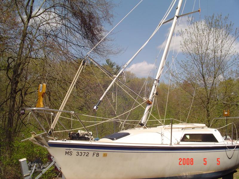 DSC01038 In mast raising with a roller furler connected to the mast the question arises; What do I do with the fuler while the mast is going up or coming down?   Well, you could have the Mate hold and guide it with the mast, or if you're by yourself, you can tie the furler luff off to the Gin Pole as seen in the picture.