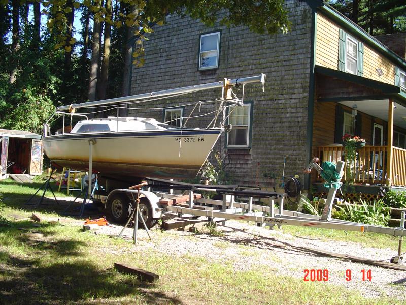 DSC01468 This is just the initial set up on the shoring.  When I get ready to raise the boat, I'll block up under the stern and bow, as close to the front of the keel as possible, and start raising the boat with the five stands.  I shore up as I raise the hull.