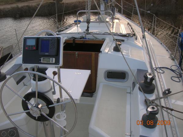 Finally back in the water. The new pedestal, navpod, and table dress up the cockpit. The cream non-skid paint should reduce the glare.