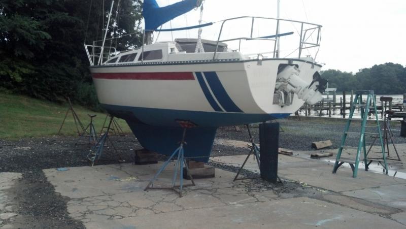 Firefly stern, showing the mighty 1986 Johnson 15HP with new water pump!