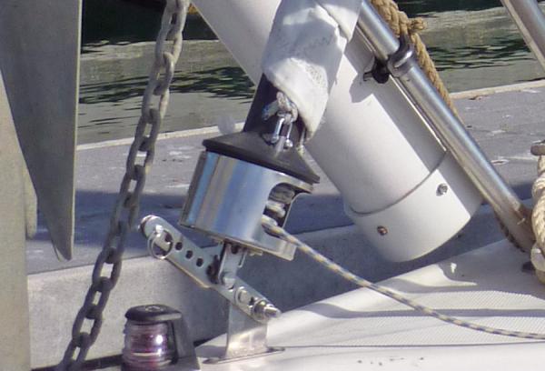 Forestay attachment detail.  The lever is a shroud tensioning plate that can pivot for attaching the roller furler and is then  pulled down for tensioning the forestay.  It is held in place by a 1/4 pin and pivots on a stainless steel bolt.