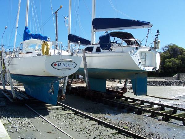 Fyne Spirit on the slip at Christchurch Yacht club, New Zealand. The boat on the left is Halberg Rassey rasmus 35, one of two wooden prototypes of this design. I own her too but must sell soon. It doesn't do to have a fleet!