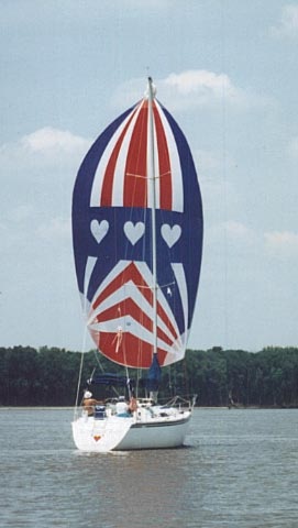 Going up river under spinnaker