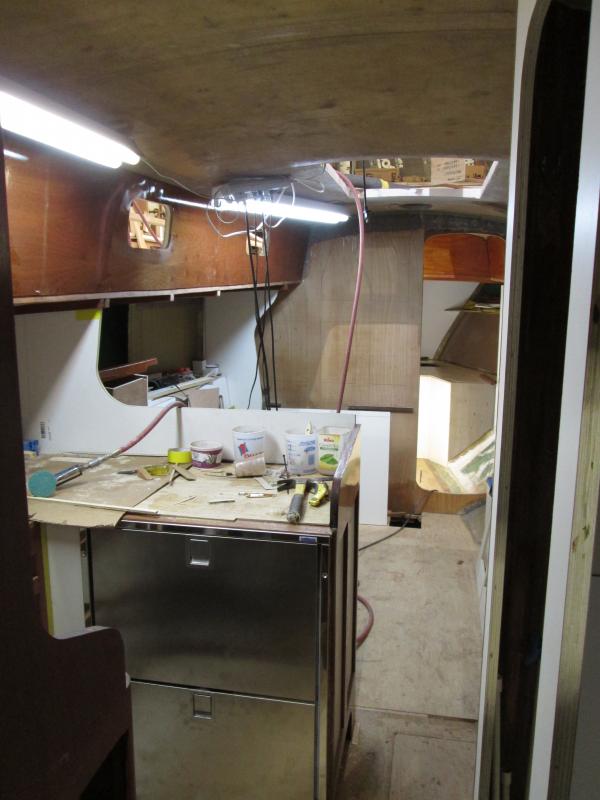 Here is the interior of C44 no.35, Alliance, looking forward from the passageway.  The head is to the right and the galley to the left.  This boat is unique in that it does not have our 11.5-cubic-foot toploader fridge but an Italian-made stainless-steel drawer type of about 6.8 cubic feet total.  Installing this thing was a chore and a half.  All of the once-successful galley was redesigned to accommodate it.

13 Jan 2015