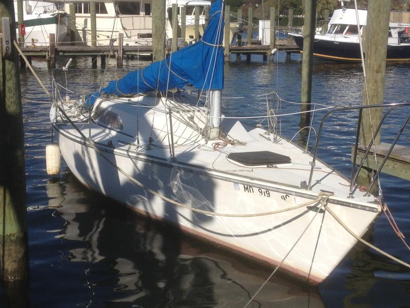 Here she is as I found her at Petrini's ship yard on Spa Creek in Annapolis. The boat was in bad shape, half sunk with a broken chain plate and damaged rub rail.