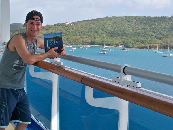 holding the book: 50 places to sail before you die. the pix cover equals the place. I and my wife are aboard the beautiful ship &quot;emerald princess&quot;.
