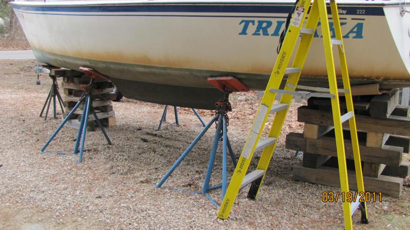 IMG 0001b I get the boat in this position for checking the centerboard and pendant line Etc.  I usually dig a hole under the keel so that I can let the centerboard all the way down to spot paint it.