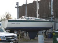 Just finished waxing the hull, bottom paint completed the day before. Just a little touch-up and it's ready to go