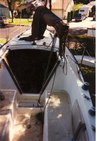 Lancer 28 deck, boat in seller's driveway.