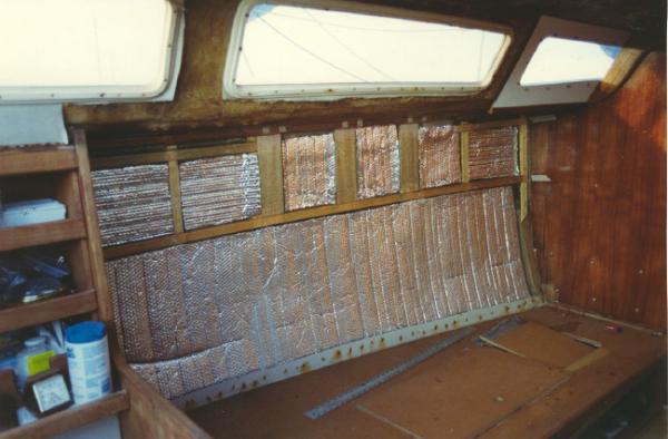 Lancer 28 interior rebuild; glassed on wood for screwing down panels, and some insulation.