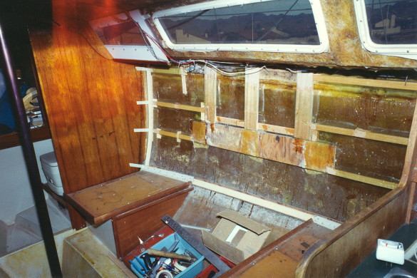 Lancer 28 interior rebuild; glassed on wood for screwing finished panels to hull.