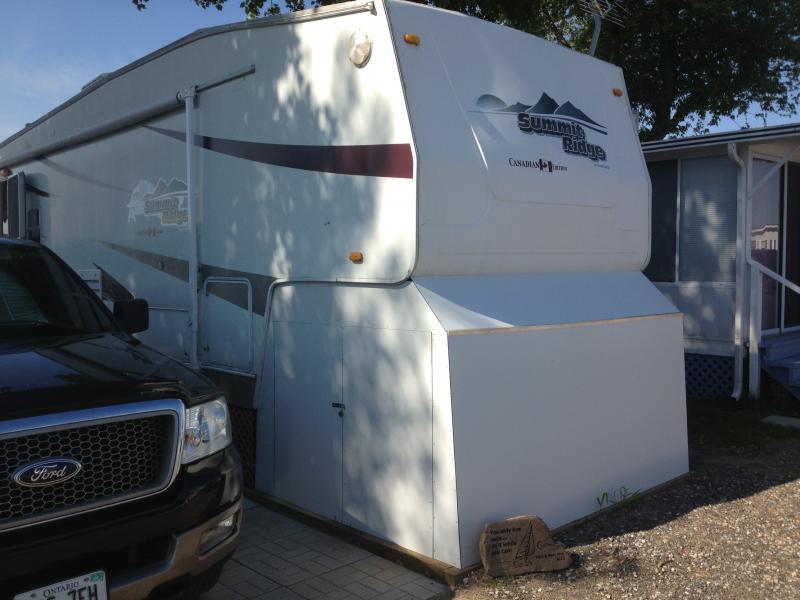 Long Point trailer with combined seawall boat slip