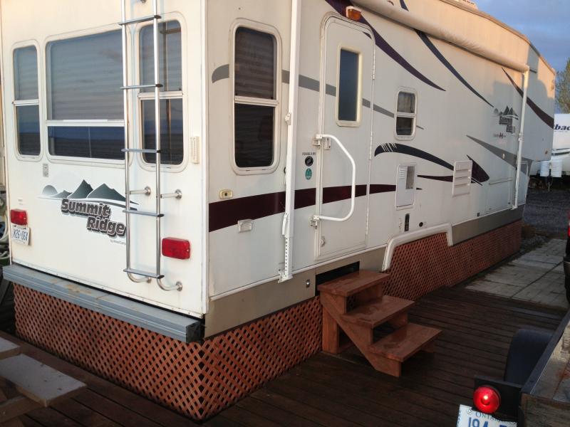 Long Point trailer with combined seawall boat slip