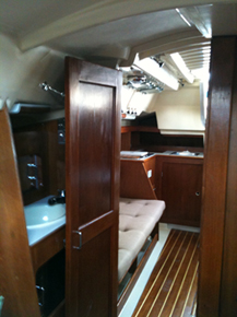 Looking aft with new cabin sole and new bulkheads installed.