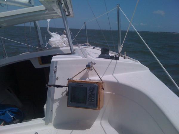 Lowrance HDS-5
 Hangs inside out of the weather when not in use.
 It has GPS/chartplotter, and fishfinder.
 The homemade box also has a 12 volt socket for aux power.