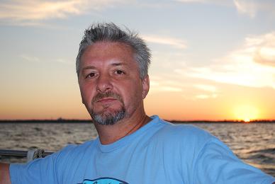 Me enjoying a great day sailing just before sunset.