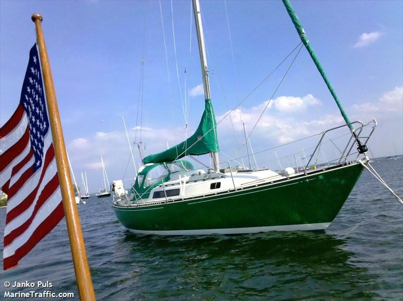 Mistral IV at her home mooring at Larchmont Yacht Club 
(with white boot and cove stripes)