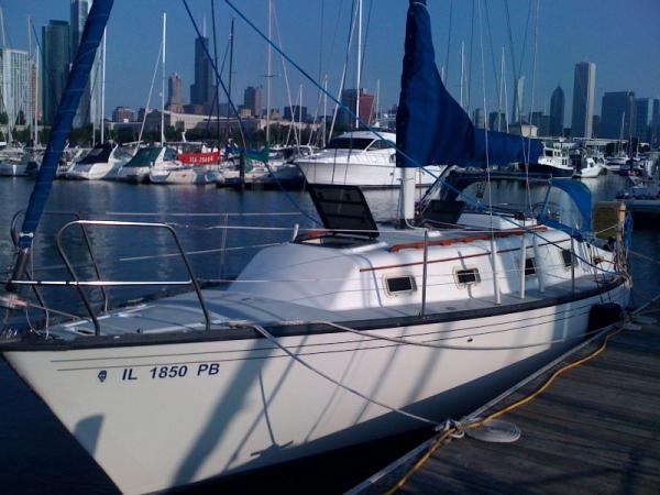 Morning on the dock, July 2010.  I never get tired of this view of the city.