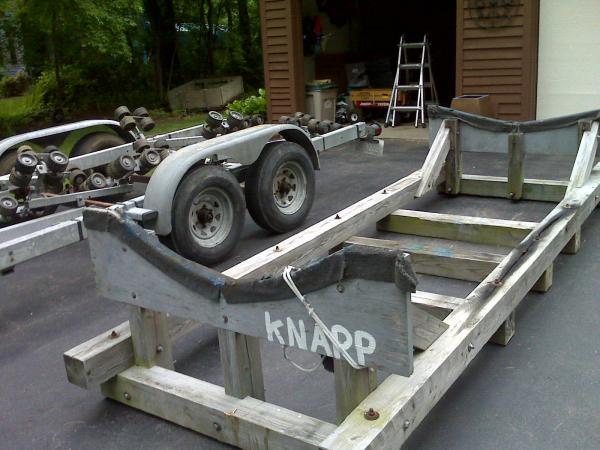 Motor boat trailer with 96 rollers, and cradle, now how to make them like each other and play nice.