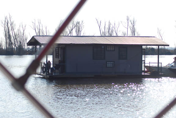 Moving day in Louisianna. Just take your boat and push your house to next area you want to live in.